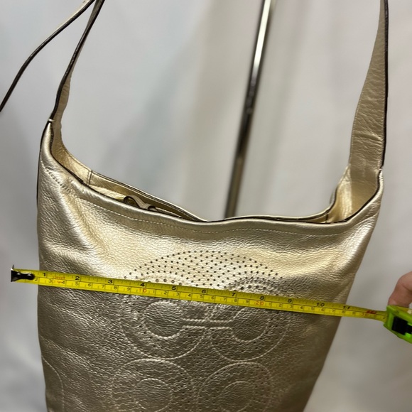 Coach gold crossbody bag.  Adjustable strap. - Picture 4 of 12